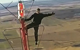 Insane Dude Climbing A Radio Tower