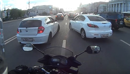Two Cars Block Motorbiker. Only In Russia!