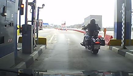 Motorcyclist Swipes A Toll